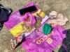 Three held with 658 gold-coloured copper pieces near Vessu